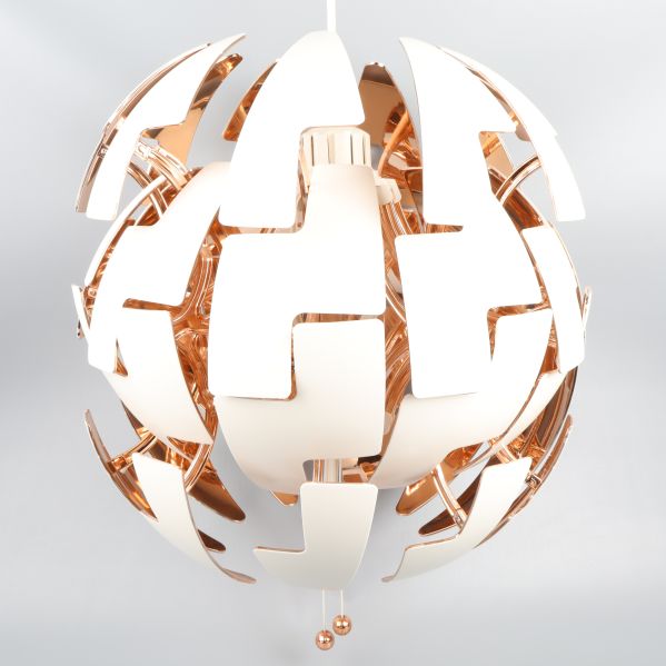 Närbild av lampa med kopparfärgade detaljer inuti